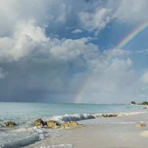 Rainbow over world famous Grace Bay beach, Providenciales, Turks and Caicos, Caribbean