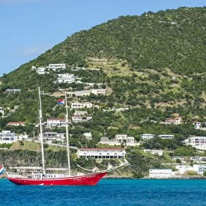 Red sailing boat in the bay of Philipsburg, Sint Maarten, West Indies, Caribbean