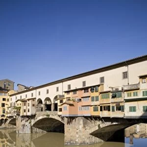 Reflection in the Arno River of the Ponte Vecchio, Florence, Tuscany, Italy, Europe