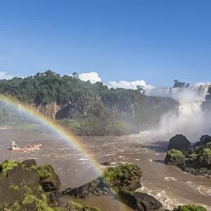 A river boat at the base of the falls, Iguazu Falls National Park, UNESCO World Heritage Site