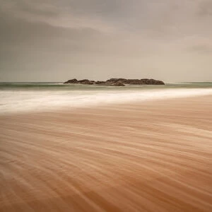 Sandwood Bay in early morning with Cape Wrath in far distance, Sutherland, Scotland