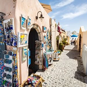 Souvenir shops selling pictures, magnets and jewellery in Oia, Santorini, Cyclades