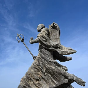 Statue of 7th century monk, Xuanzang, carrying Buddhist sutras, Gaochang ruins, Xinjiang