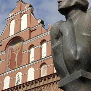 Statue of Adam Mickiewicz with Bernardine church and