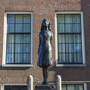 Statue of Anne Frank outside Westerkerk, near her house, Amsterdam, Netherlands, Europe