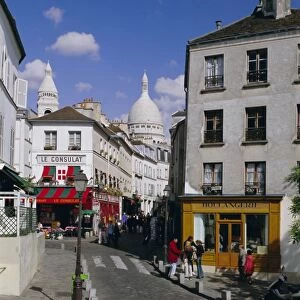 Street scene and the dome of the basilica of Sacre Coeur, Montmartre, Paris
