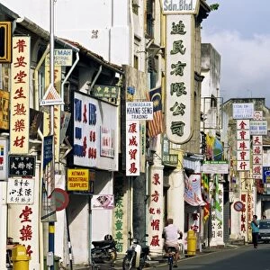 Street scene with shop signs in Chinatown in the centre of Georgetown