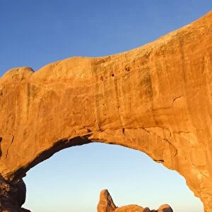Sunrise on North Arch and Tower Arch in the Windows