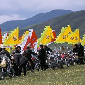 Tibetans using motorbikes instead of horses, festival, Qinghai Province, China, Asia