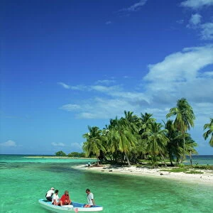 Tourists in boat, Laughing Bird Cay, Belize, Central America