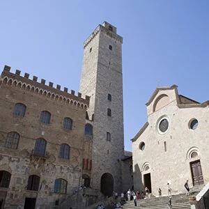 Tower, Palazzo del Popolo and fa?ade of Duomo in San Gimignano, Tuscany, Italy