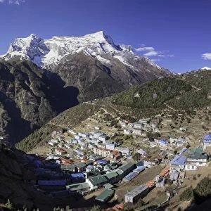 The town of Namche Bazaar with the Kongde Ri (Kwangde Ri) mountain range in the background, Himalayas, Nepal, Asia