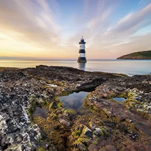 Trwyn Du Lighthouse at sunset in summer, Beaumaris, Wales, Great Britain, United Kingdom, Europe