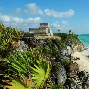 Tulum beach and El Castillo temple at ancient Mayan site of Tulum, Tulum