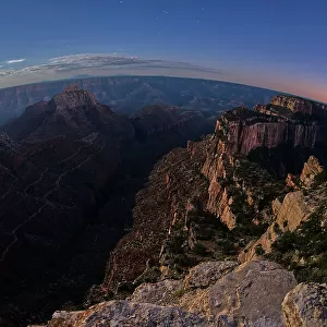 View from Cape Royal, below is Vishnu Creek running between Vishnu Temple on the left with Wotans Throne on the right at twilight with the Moon rising, Grand Canyon National Park, UNESCO World Heritage Site, Arizona, United States of America