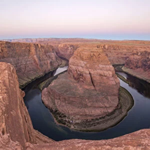 View from cliff edge over the Colorado River at Horseshoe Bend, dawn