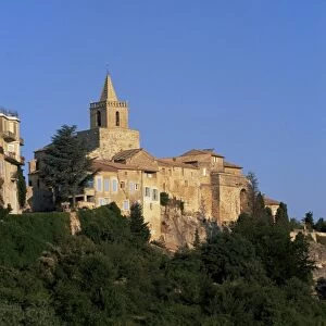 View to village houses and church in the early morning, Venasque, Vaucluse