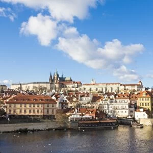 View of the Vltava River surrounded by the historical buildings, Prague, Czech Republic