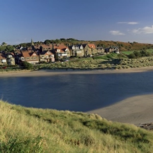 Village of Alnmouth with River Aln flowing into the North Sea, fringed by beaches