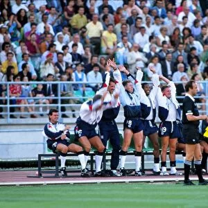 The England bench do a Mexican Wave during Italia 90