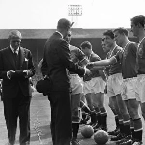 Manchester Uniteds Bobby Charlton shakes hands with Prince Philip before the 1958 FA Cup Final