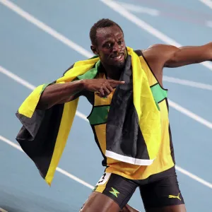 Usain Bolt celebrates his 200m gold medal