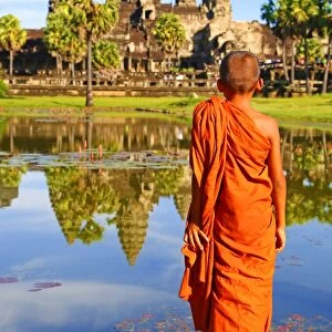 Angkor Wat Temple with young Buddhist Monk, Siem Reap, Cambodia