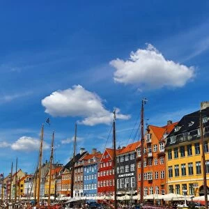 Coloured houses and boats at Nyhavn Quay in Copenhagen, Denmark