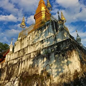 Golden Wat That Chomsi temple Stupa on Mount Phousi in Luang Prabang, Laos