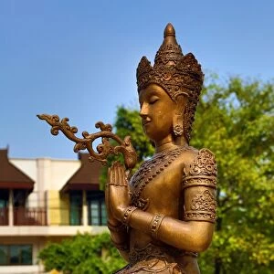 Statue at the City Pillar Shrine at Wat Chedi Luang Temple in Chiang Mai, Thailand