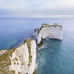 Aerial view at sunrise of the Old Harry Rocks, chalky formations near Handfast Point