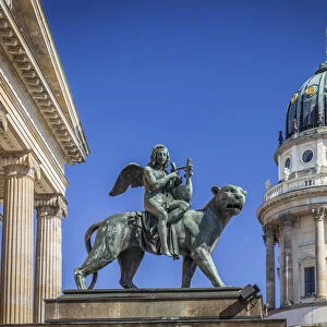 Angel statue on lion at Berlin Concert Hall and French Cathedral, Gendarmenmarkt, Berlin