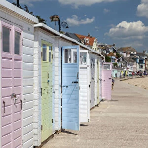 Beach huts in the seaside resort of Lyme Regis, Dorset, England