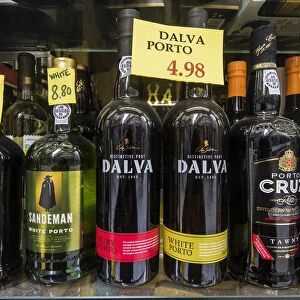 Bottles of Porto wine on sale in a grocery store, Porto, Portugal