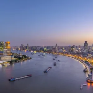 China, Shanghai, Pudong District Skyline across Huangpu River