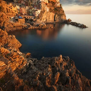Coastal town of Manarola at sunset, Cinque Terre, Liguria, Italy