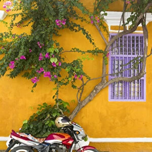 Colombia, Bolivar, Cartagena De Indias, Motobike outside colonial house