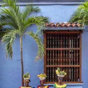 Colourful Palenqueras selling fruits on the street of Cartagena, Bolivar Department