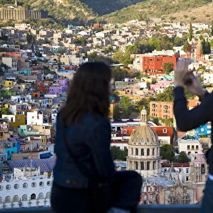Couple taking picture over Guanajuato, Guanajuato state, Mexico
