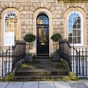The front door of a house in Great Pulteney Street, Bath, Somerset, England