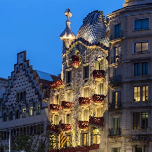 Dusk view of Casa Batllo beautifully adorned with roses to support a local charity