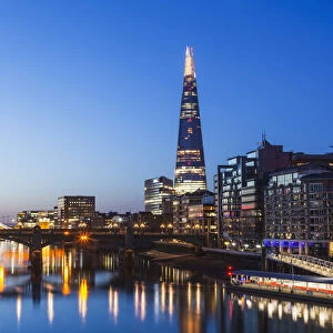 England, London, Thames River and London Skyline at Dawn