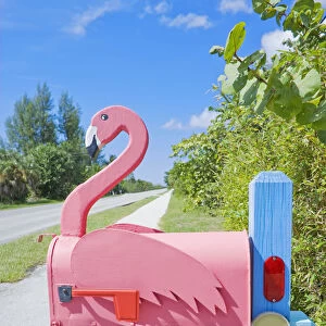 Flamingo made of wood attached to mailbox, Sanibel Island, Florida, USA