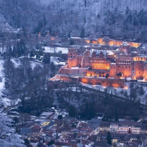 Illuminated Heidelberg castle and old town in winter, Baden-Wurttemberg, Germany