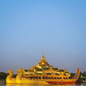 Karaweik Palace on Kandawgyi Lake at dusk, Yangon, Yangon Region, Myanmar