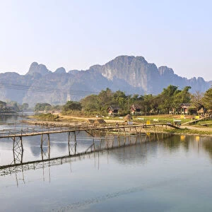 Laos, Vang Vieng. Town and Nam Song river at sunrise