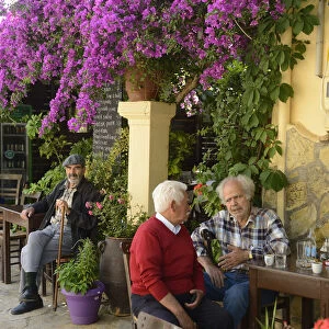 Local men at a cafe in Kroustas, Crete, Greece, Europe