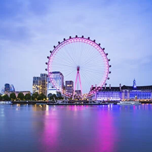 London Eye reflecting on the river Thames, London, England, UK