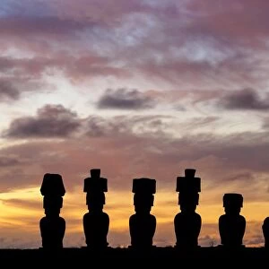 Moais in Ahu Nau Nau by the Anakena Beach at sunset, Rapa Nui National Park, Easter Island