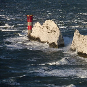 The Needles Lighthouse during stormy weather, Isle of Wight, England. Autumn